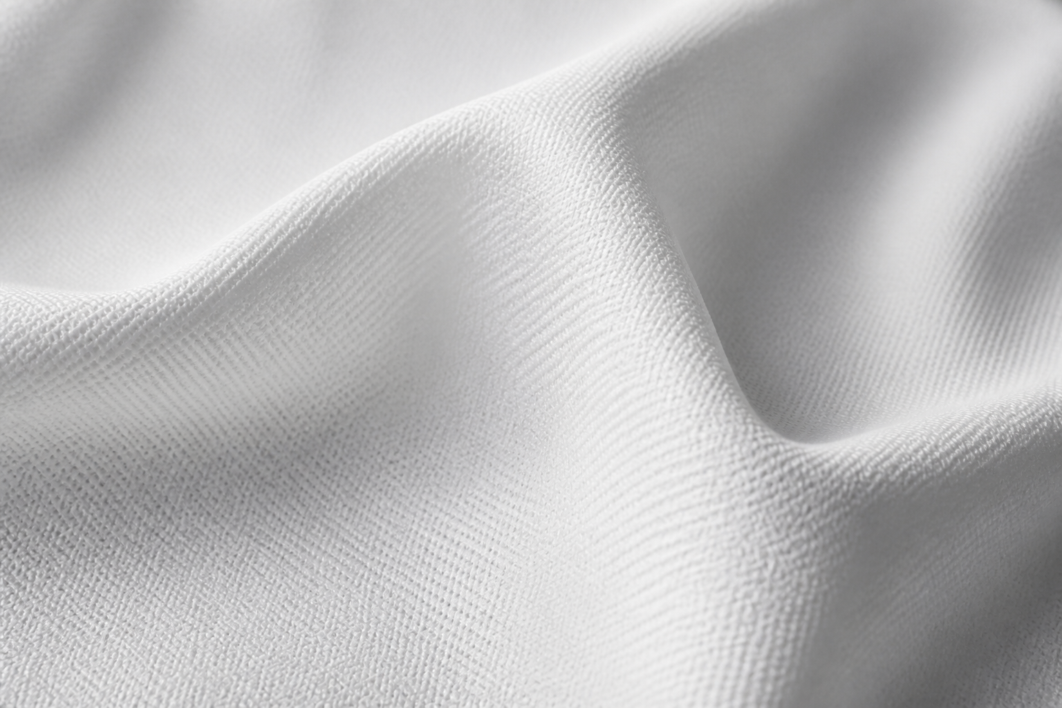 White jacket fabric texture representing clean corporate design standards